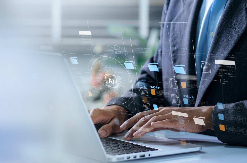 Association professional using a computer with different technology applications