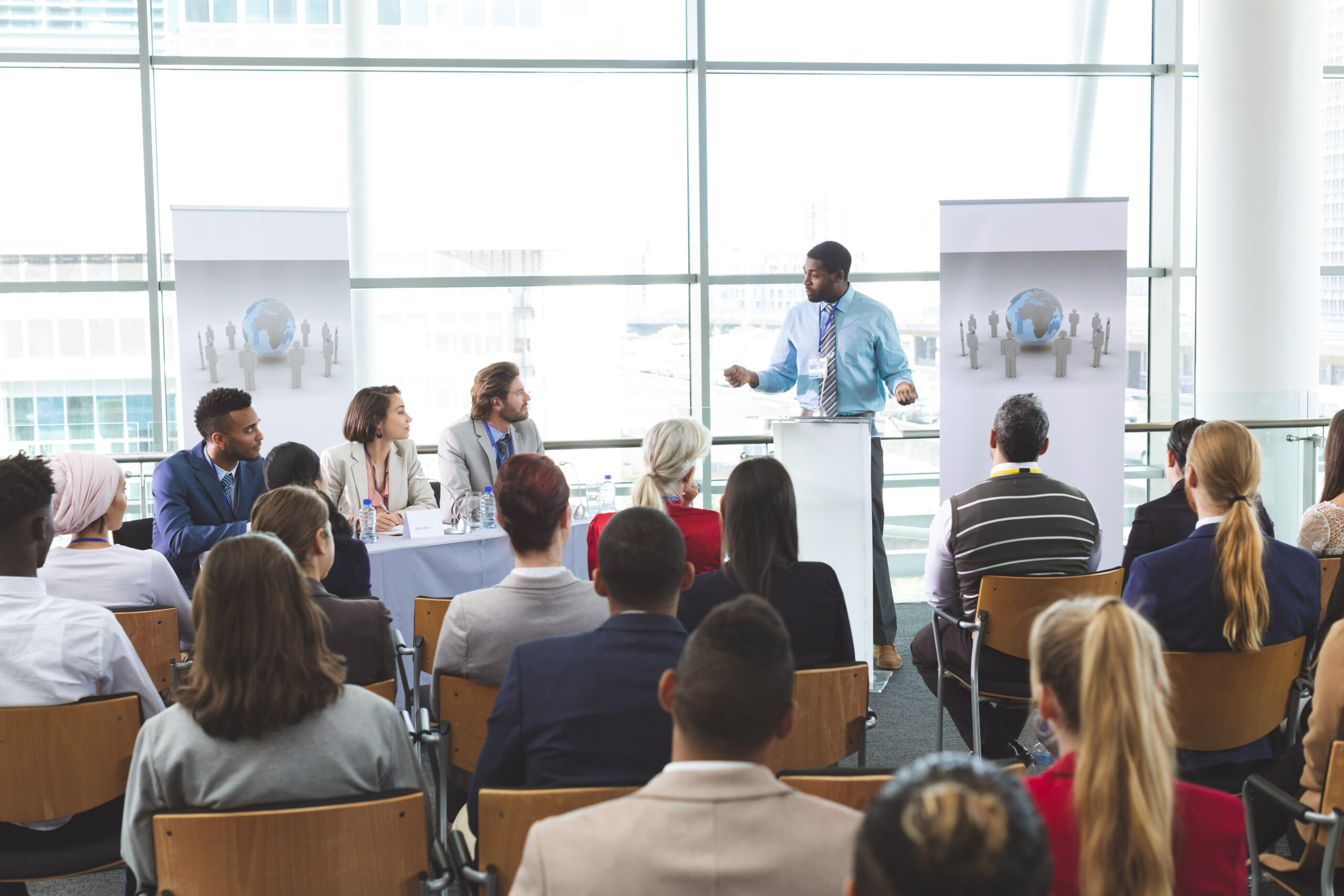 Male speaker speaks about DEI in a business meeting